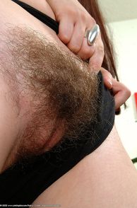 Black Panties Pulled Over Revealing Hairy Twat Close Up